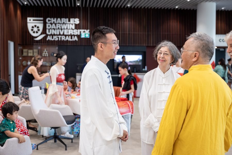 Guests talking together during the celebration