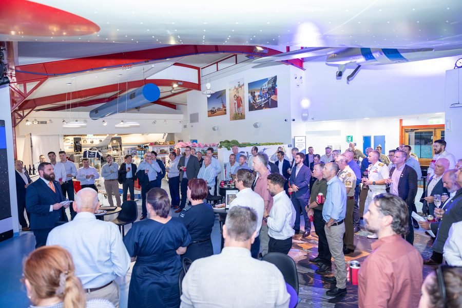 Packed hall beneath the aircraft during Defence Week