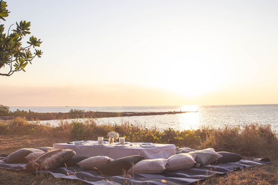 Low picnic setting on the headland at sunset